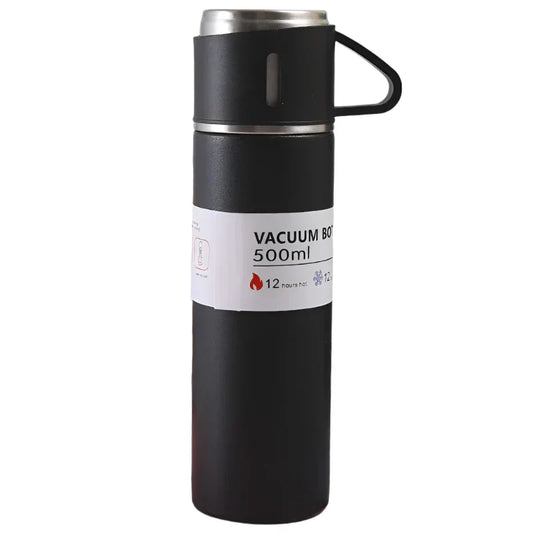 Black vacuum bottle with silver lid on a white background